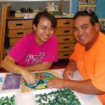 Parents of the models, Jayna and William Elisaga work together on the project.