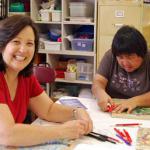 Susan Kam thought of the mural idea, and she and Joy Nishimura both worked to bring the mural to the school.